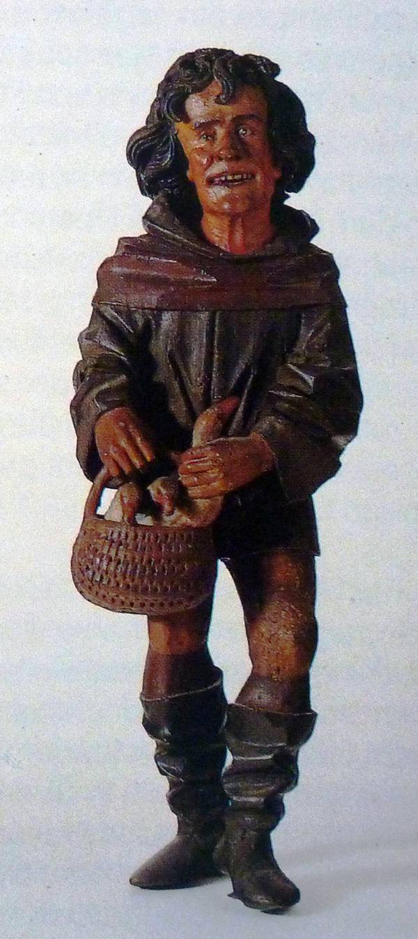 Leibeigener mit Fasnachtshühnern. Holzfigur,  1534. Rathaus Überlingen.